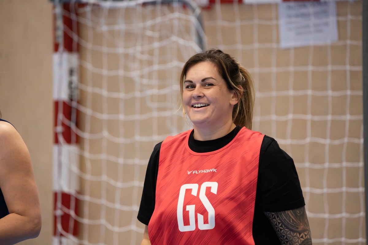 A goal shooter laughing during the game
