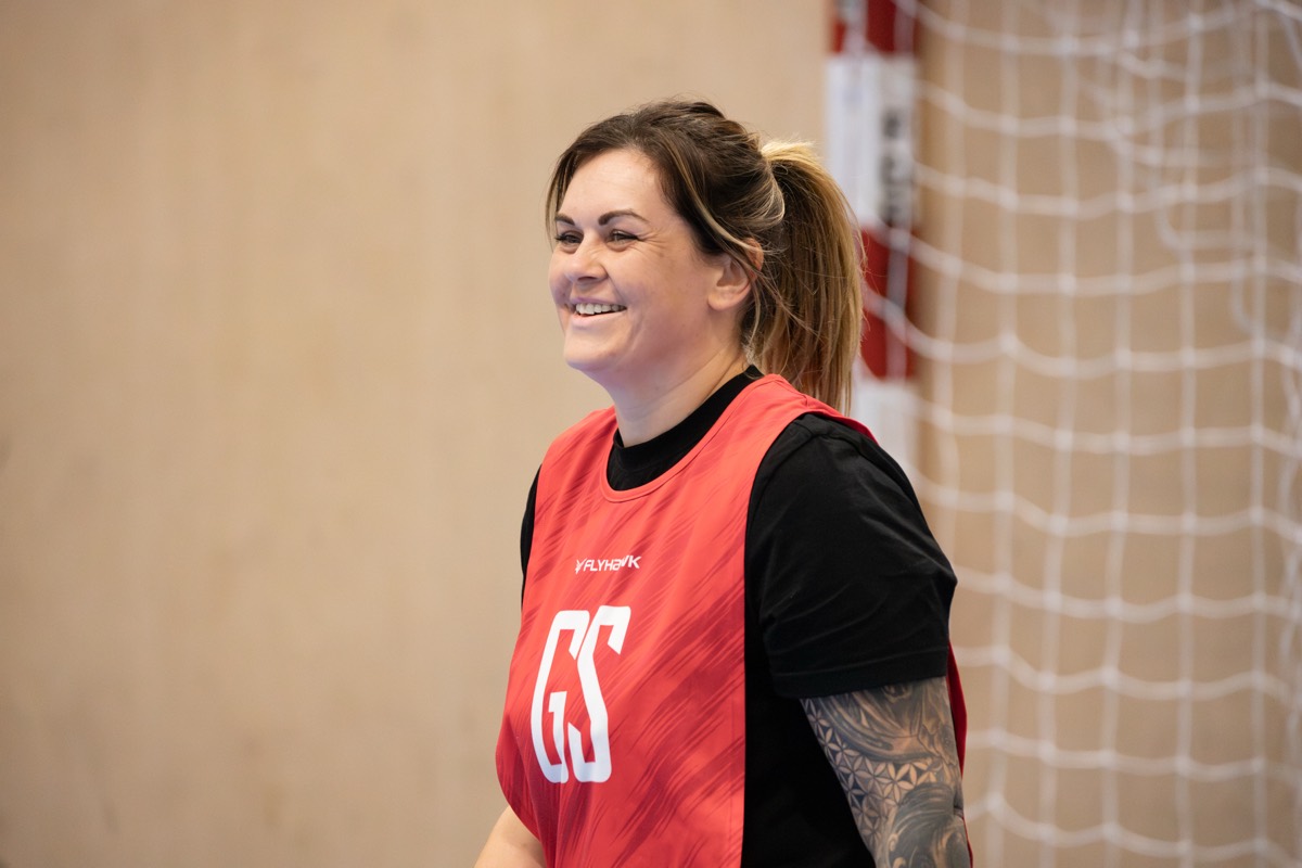 A player smiling on court