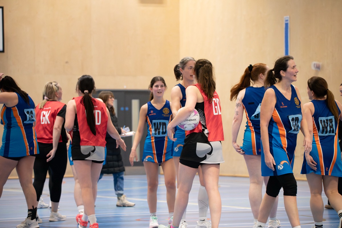 Both teams shake hands after the game